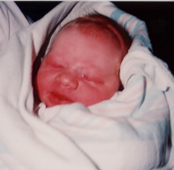 In daddy's arms