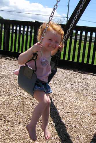 Sophie really enjoys the swing Sophie swinging